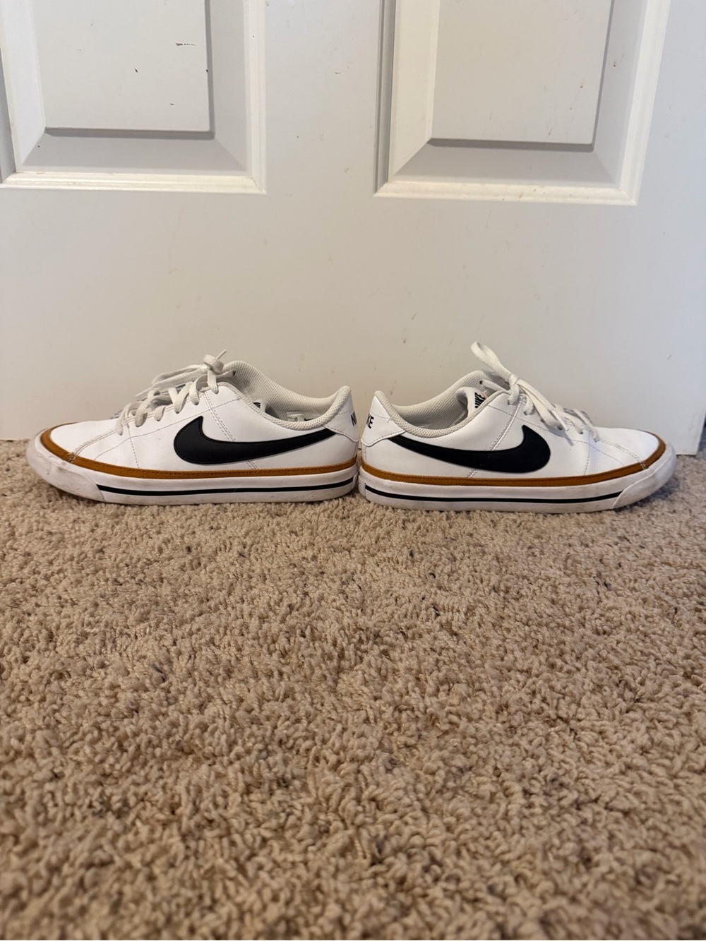 Nike White Low-Top Legacy Court Shoes with Black Swoosh and Gold Trim 7Y